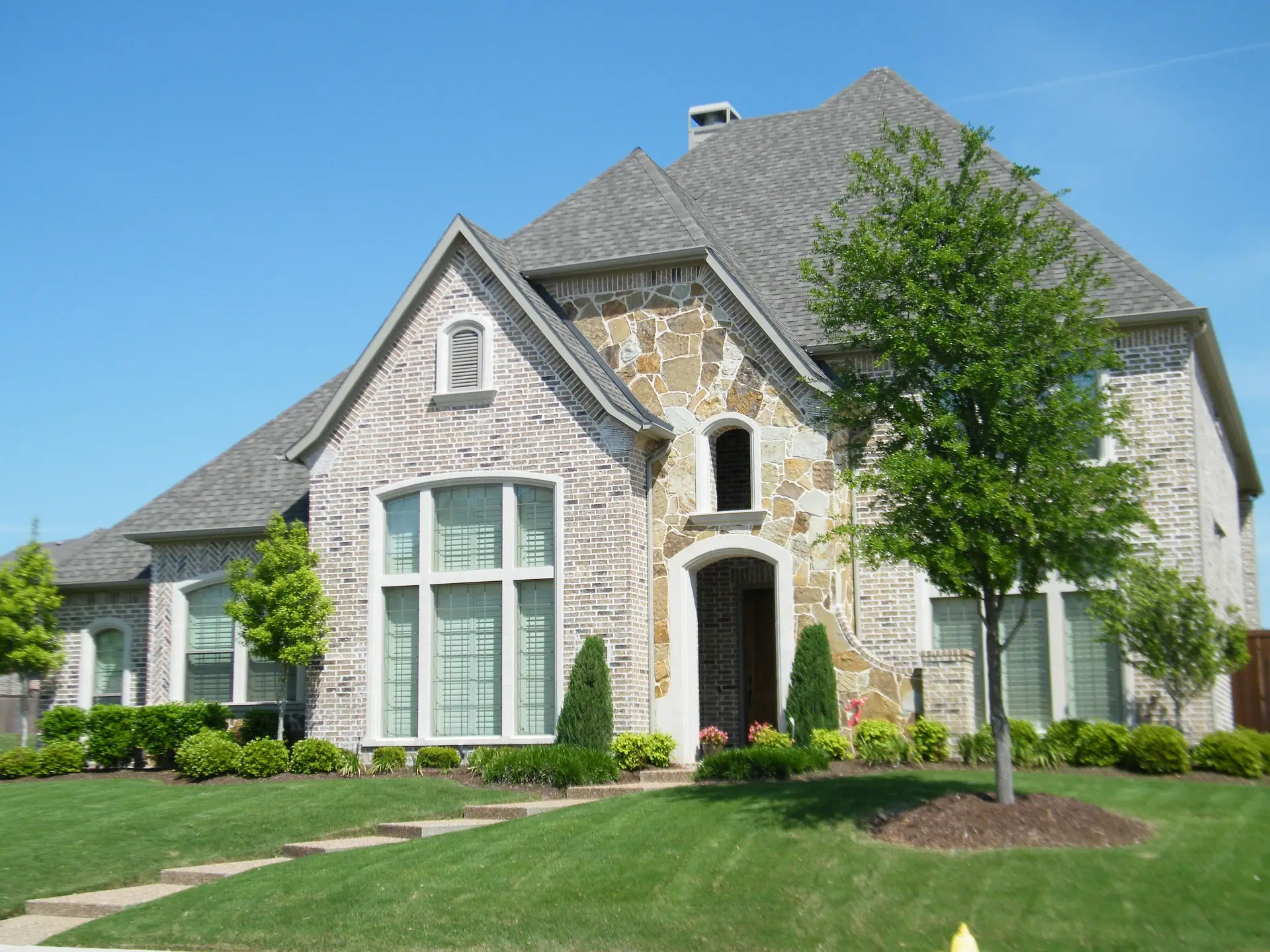 Hall of Fame Construction Group Shingle Roof House